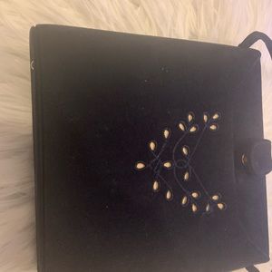 Vintage purse. Latch. Very elegant.